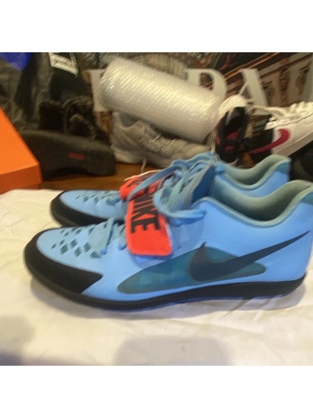 Nike Light Blue Sneakers with Neon Orange Strap
